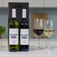 Personalised Fine Wine Birthday Duo featuring custom-labeled red and white wine bottles for 'Donal', with filled wine glasses and black gift bag in the background. Personalised Fine Wine Birthday Duo featuring custom-labeled red and white wine bottles for 'Donal', with filled wine glasses and black gift bag in the background.